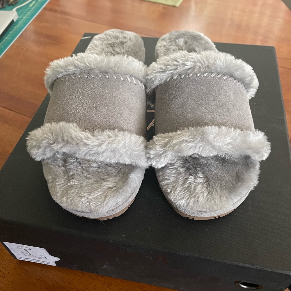 Suede and comfy slides brand Minnetonka